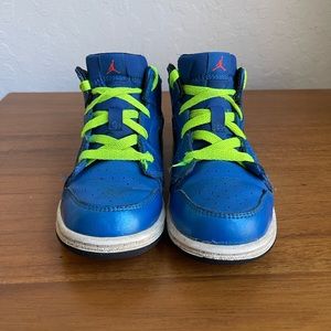Nike Air Jordan 1 Mid toddler size: 10C color: bright blue, black, white, pink.